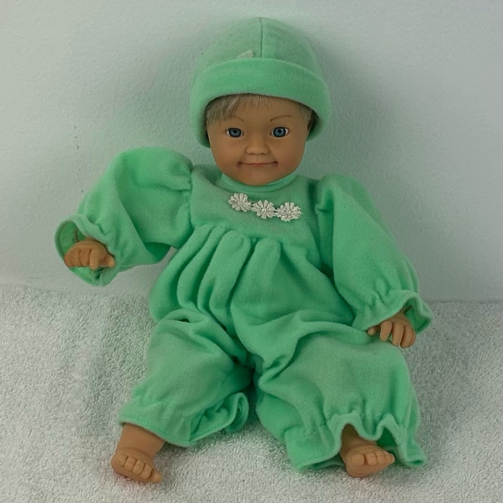 VTG '1998' Cititoy  vinyl-face baby doll wearing a soft green fleece outfit